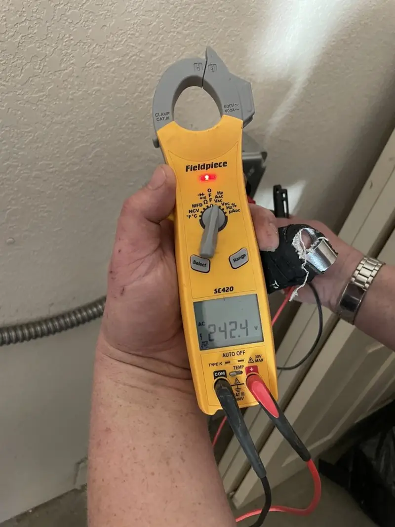 Voltage testing with clamp meter during Whole House Surge Protector in Windom